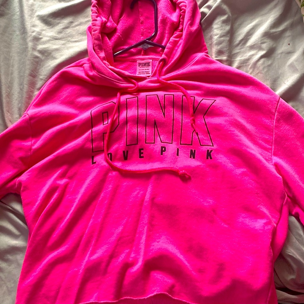 Pink/Victoria’s secret, thin hoodie with slice in the back.